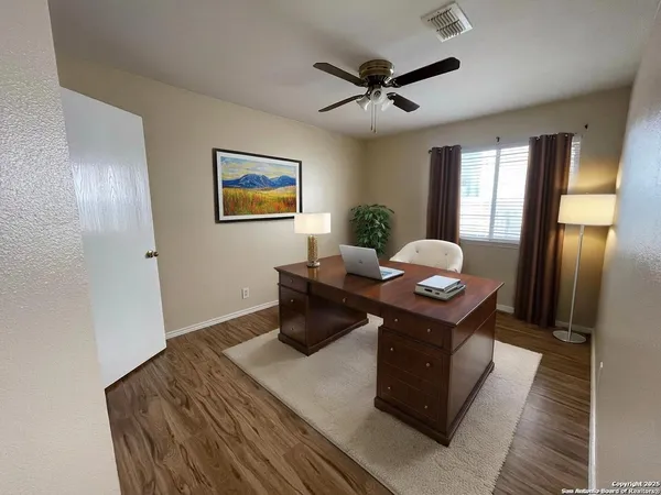 a view of a livingroom with furniture and window