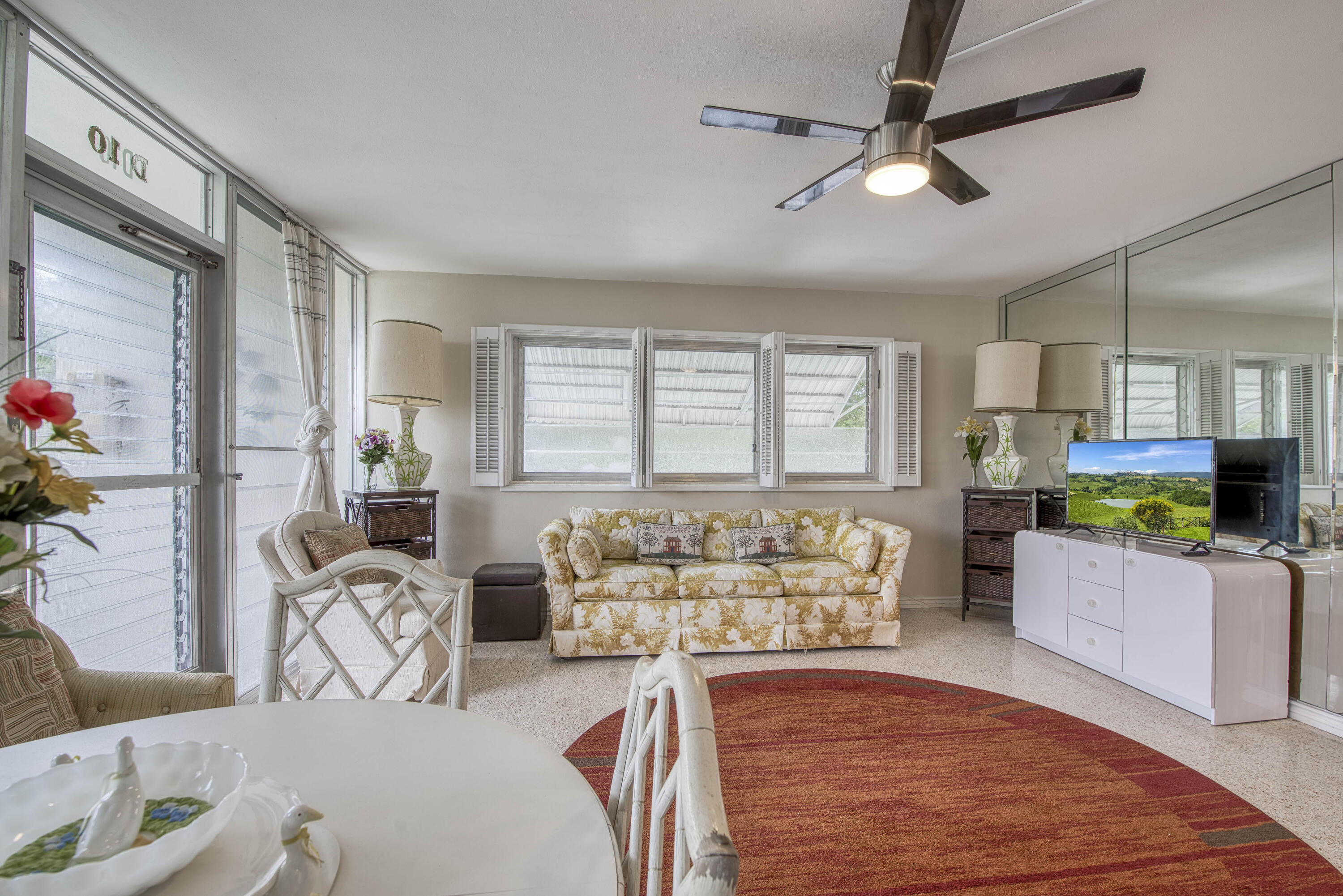 901 North Birch Road, Unit D10 Fort Lauderdale, FL 33304 - Photo 6 of 20 a very nice looking living room with a large window