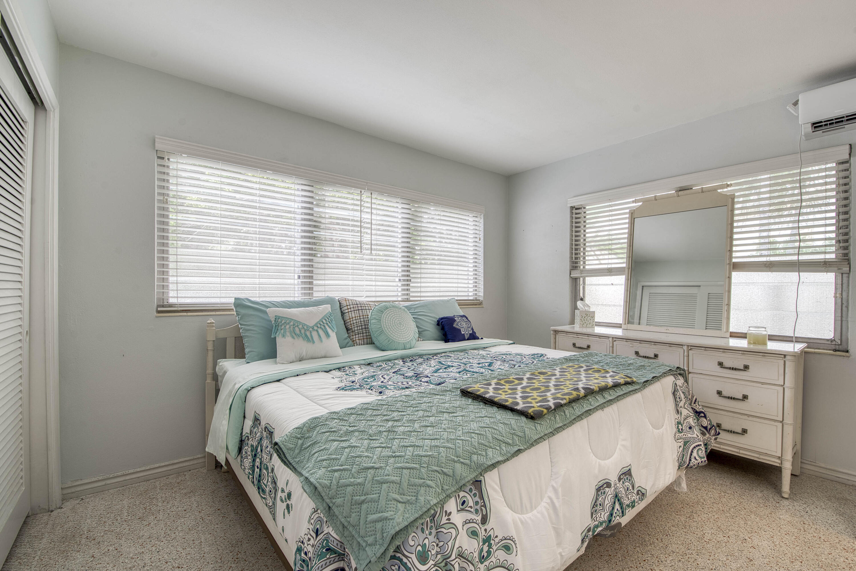 901 North Birch Road, Unit D10 Fort Lauderdale, FL 33304 - Photo 7 of 20 a bedroom with a bed and a large window