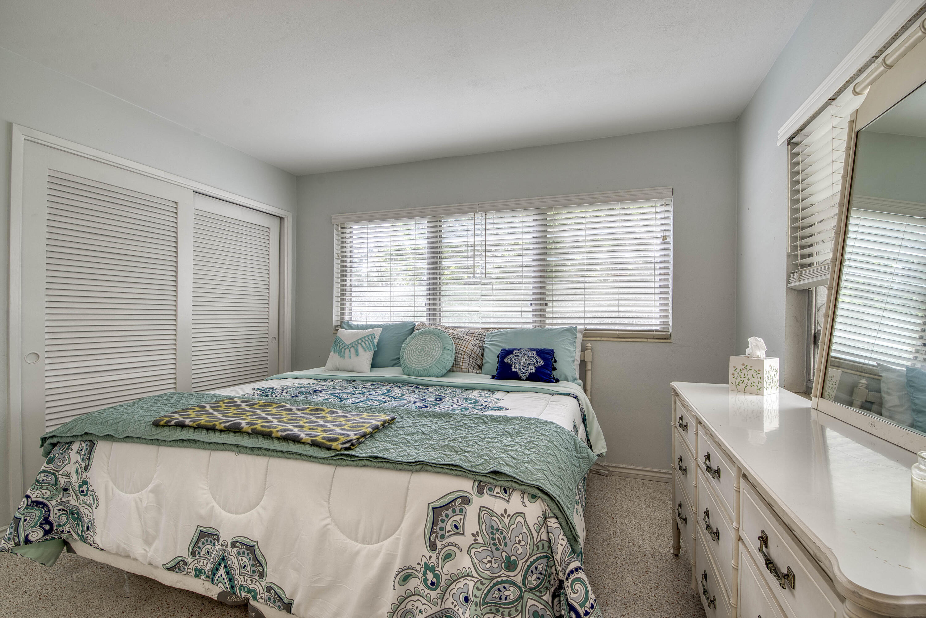 901 North Birch Road, Unit D10 Fort Lauderdale, FL 33304 - Photo 8 of 20 a bedroom with a bed and a window