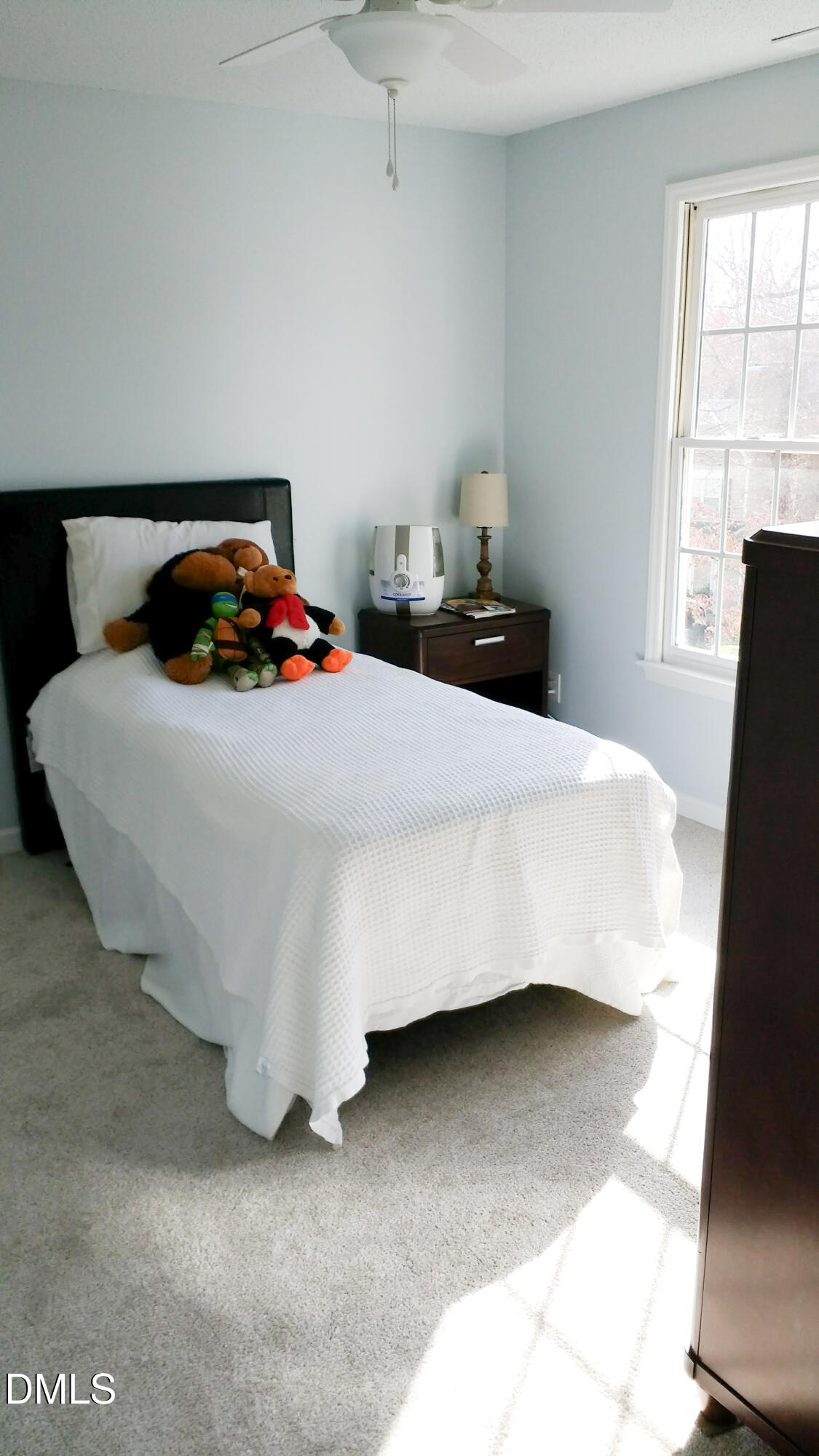 3109 Benton Circle Raleigh, NC 27615 - Photo 13 of 29 a bedroom with a bed and window