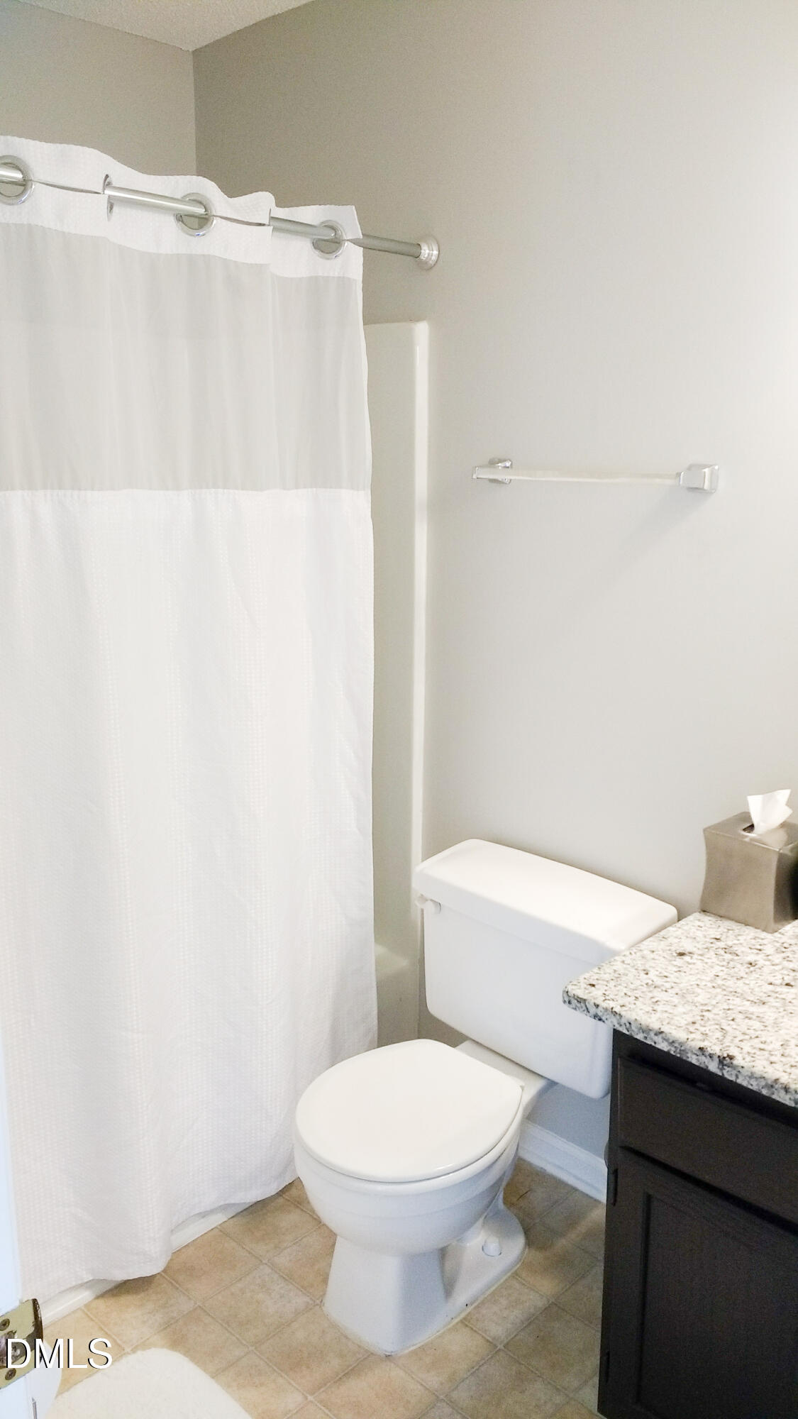 3109 Benton Circle Raleigh, NC 27615 - Photo 14 of 29 a white toilet sitting next to a bathroom sink