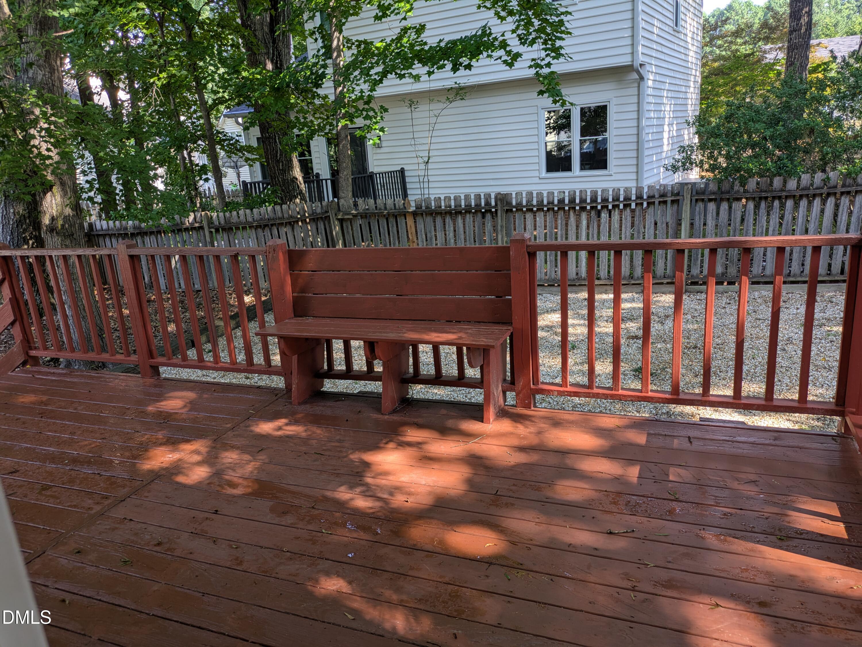 3109 Benton Circle Raleigh, NC 27615 - Photo 20 of 29 a view of a house with wooden deck and a backyard