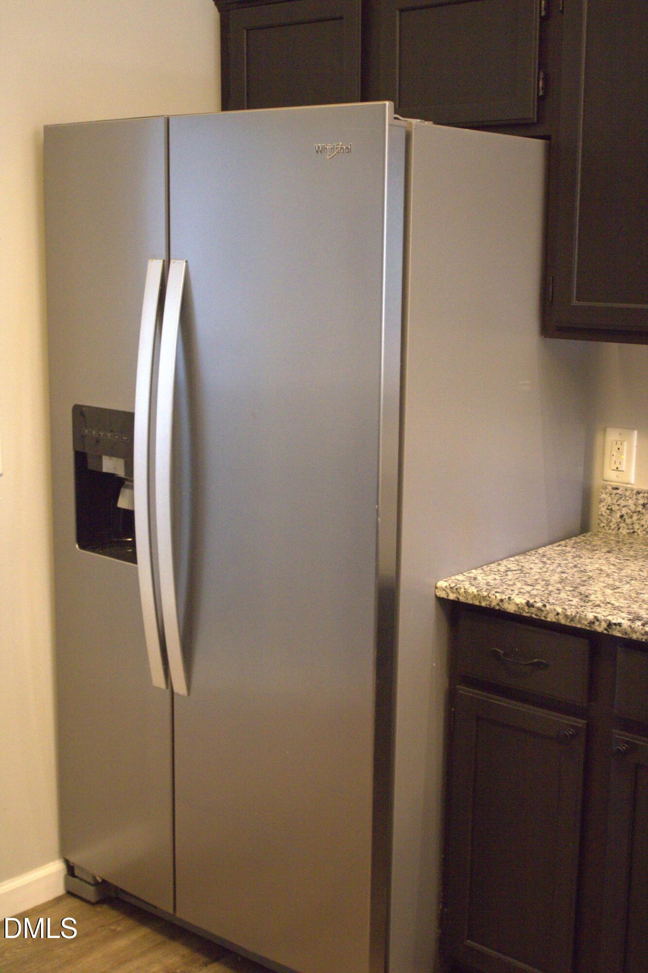 3109 Benton Circle Raleigh, NC 27615 - Photo 7 of 29 a view of a kitchen with wooden floor