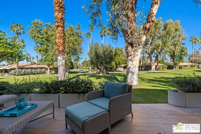 a view of a couches in a park