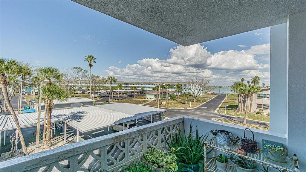 7 Elgin Place, Unit 301 Dunedin, FL 34698 - Photo 17 of 35 a view of a balcony with an outdoor space
