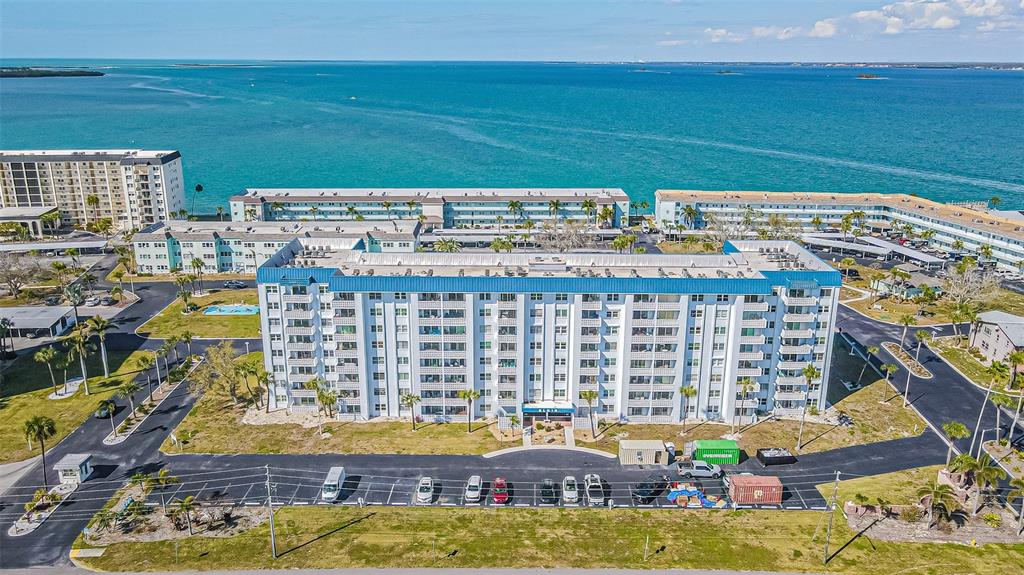 7 Elgin Place, Unit 301 Dunedin, FL 34698 - Photo 29 of 35 a view of swimming pool with outdoor seating