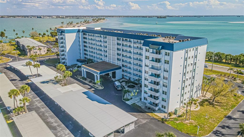 7 Elgin Place, Unit 301 Dunedin, FL 34698 - Photo 34 of 35 an aerial view of a house with a yard