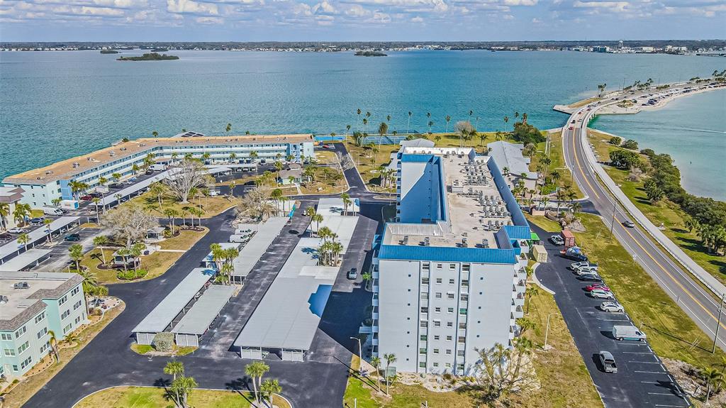 7 Elgin Place, Unit 301 Dunedin, FL 34698 - Photo 35 of 35 an aerial view of houses with outdoor space