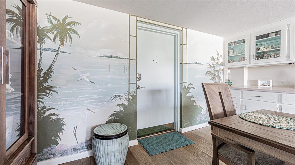 7 Elgin Place, Unit 301 Dunedin, FL 34698 - Photo 7 of 35 a bathroom with a granite countertop sink a toilet and a shower