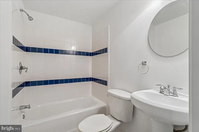 an aerial view of a house with a yard and potted plants