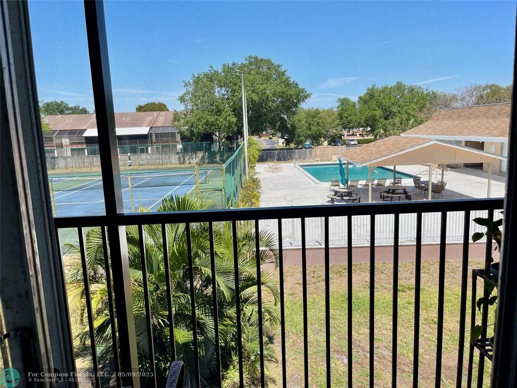 7175 Orange Drive, Unit 216H Davie, FL 33314 - Photo 3 of 14 a view of building from a balcony