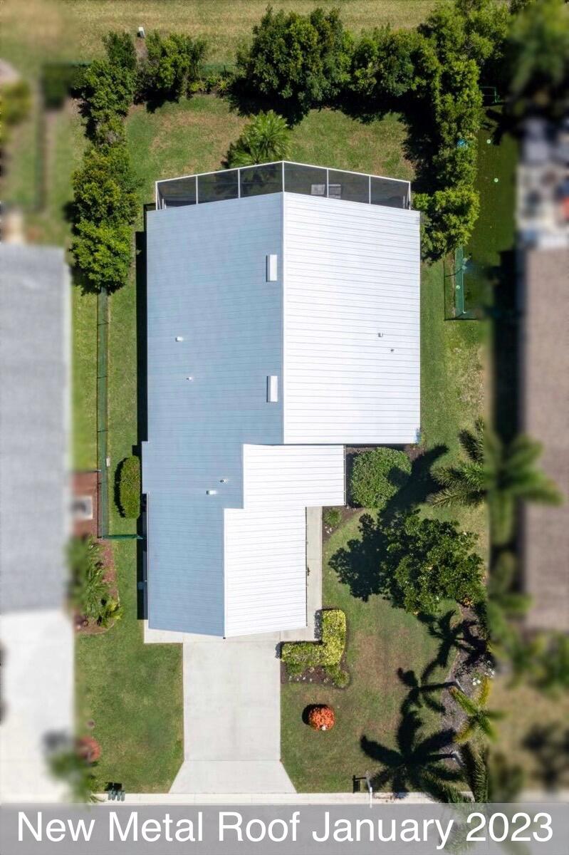 2776 Southwest Riviera Road Stuart, FL 34997 - Photo 4 of 62 New Metal Roof Jan. 2023