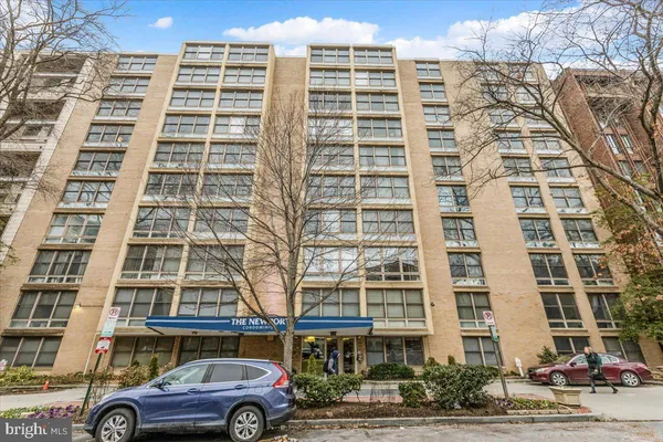 front view of a building with a parking space