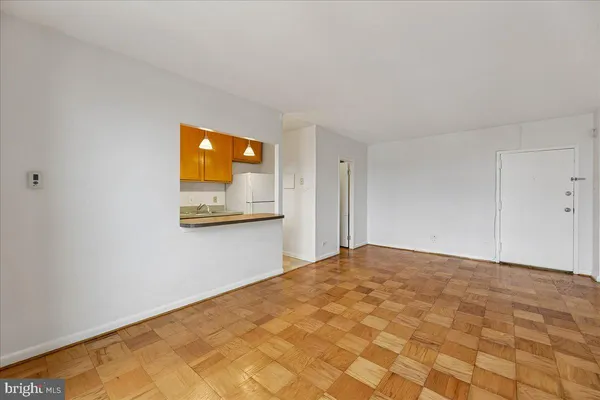 a bedroom with a bed and mirror