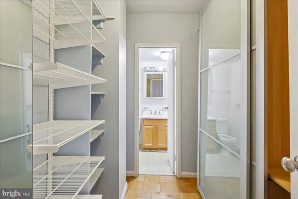 a view of an empty walk in closet