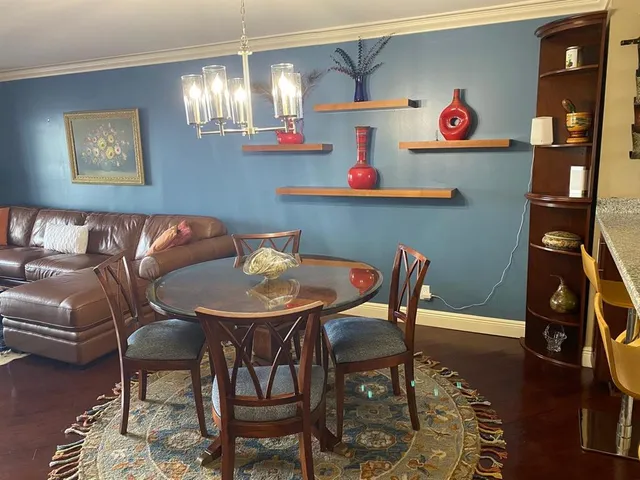 a living room with lots of furniture and appliances