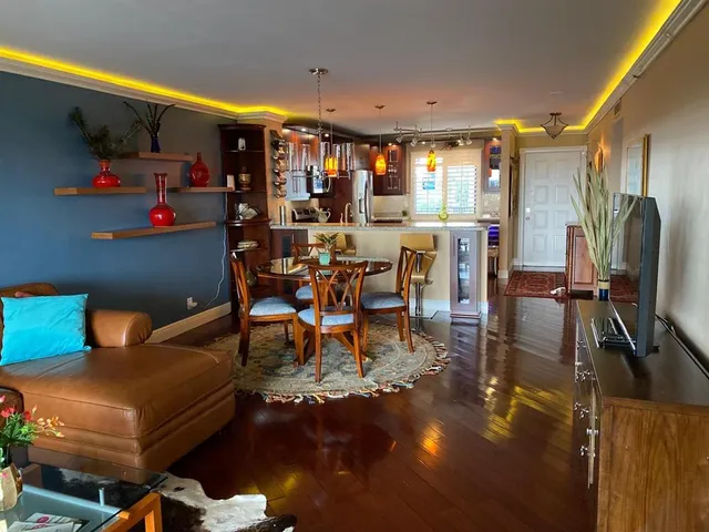 a living room with furniture and a couch