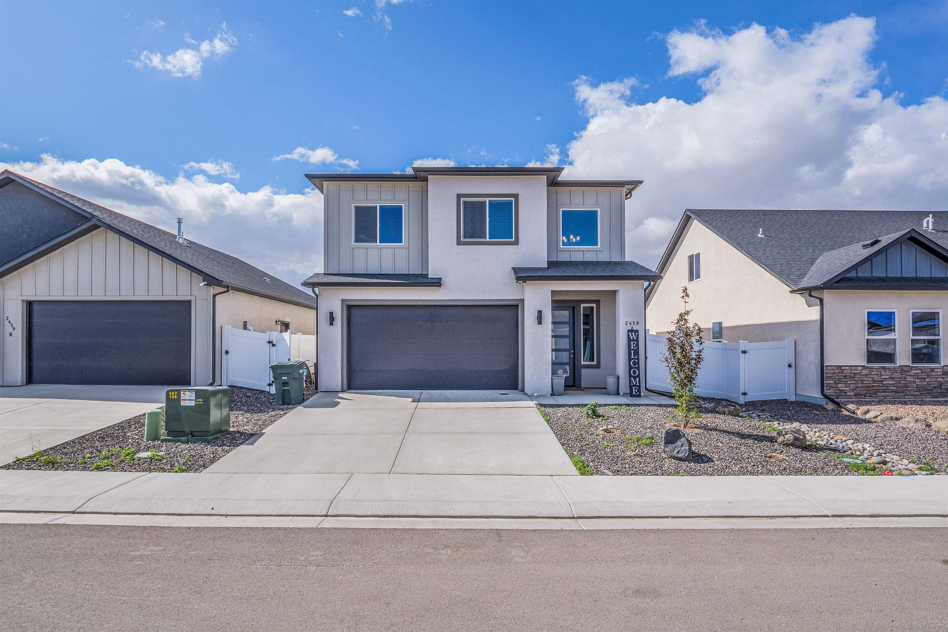 2459 Hamilton Road, Unit A Grand Junction, CO 81505 - Photo 2 of 27 a front view of a house with yard