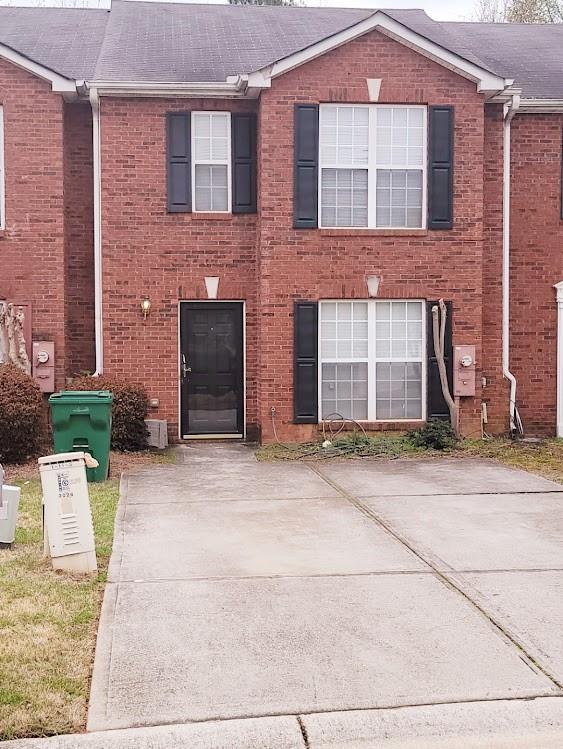 3028 Waldrop Circle Decatur, GA 30034 - Photo 1 of 1 a front view of a house with a yard