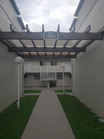 a view of a porch and a yard