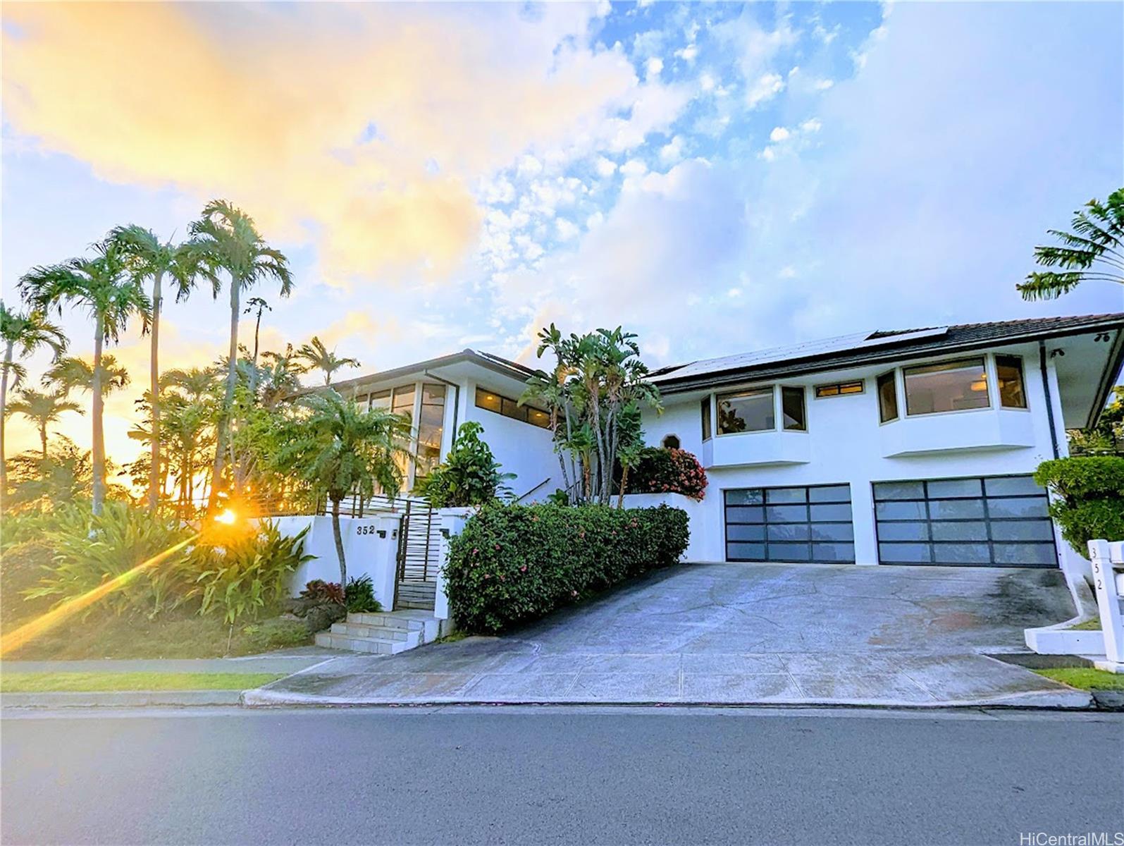 352 Lelekepue Place Honolulu, HI 96821 - Photo 1 of 1 a front view of a house with a yard and garage