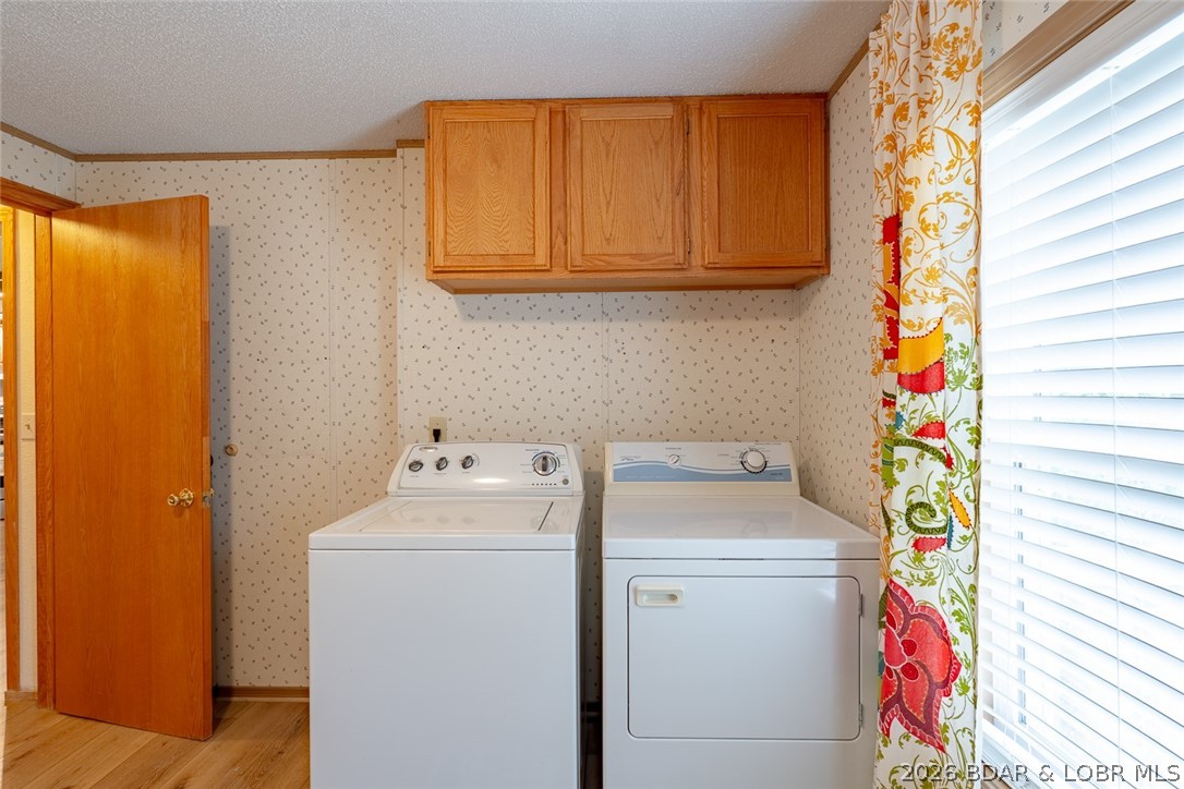 3135 Lick Creek Road Edwards, MO 65326 - Photo 44 of 94 main floor laundry room