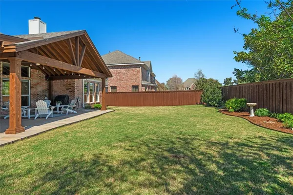a view of outdoor space with seating area