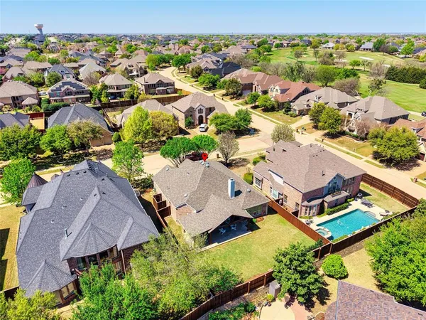 an aerial view of residential house with outdoor space