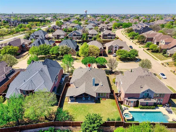 an aerial view of residential house with outdoor space