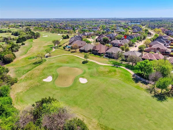 a view of a lake with a city