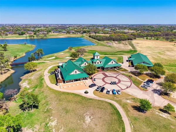 an aerial view of a swimming pool with outdoor space