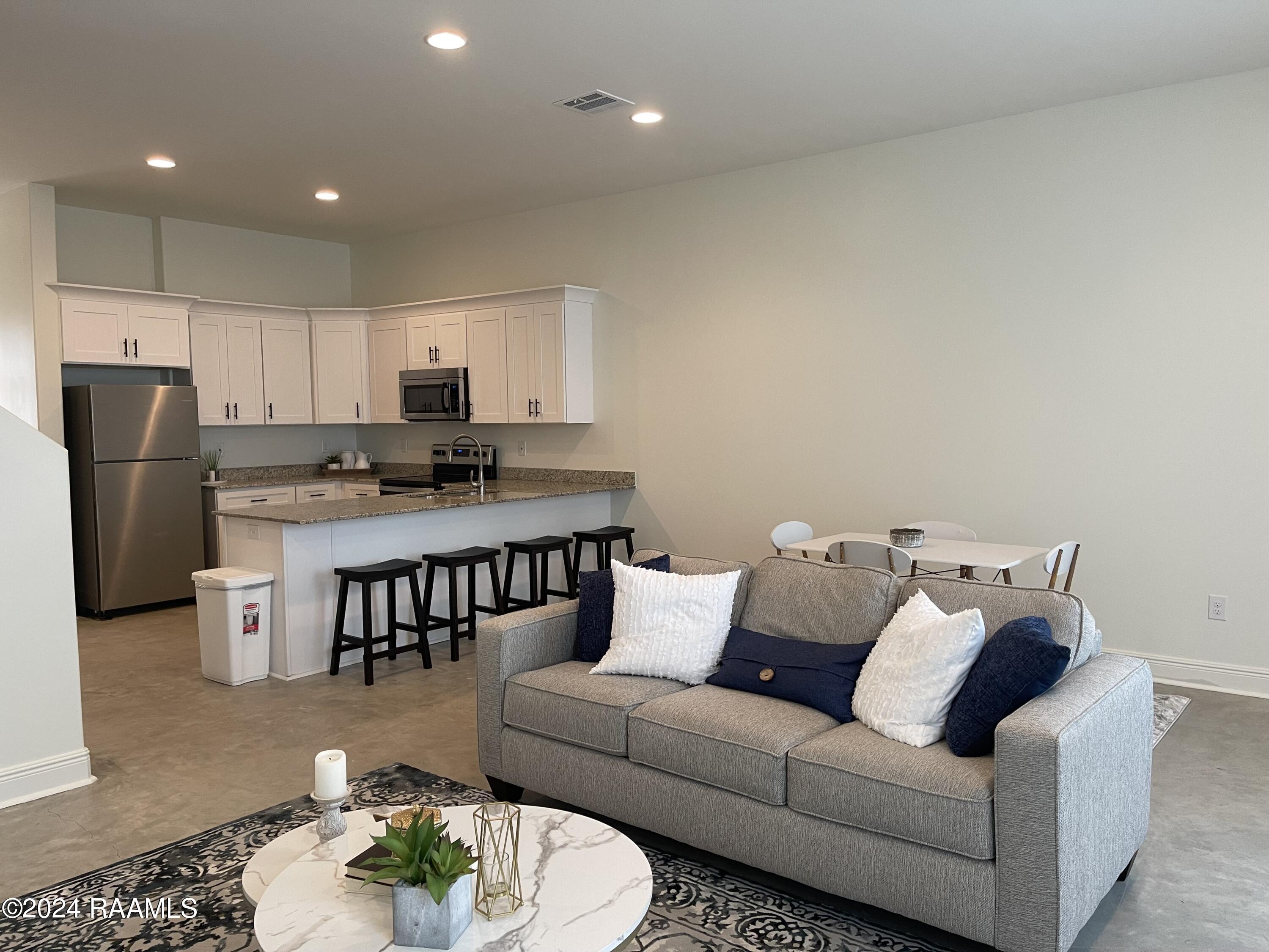 721 Almonaster Road, Unit 3 Youngsville, LA 70592 - Photo 3 of 10 IMG_4433