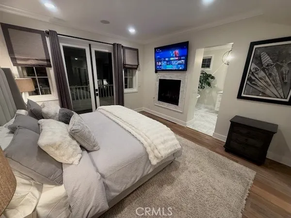 a bathroom with a sink a toilet a mirror and vanity