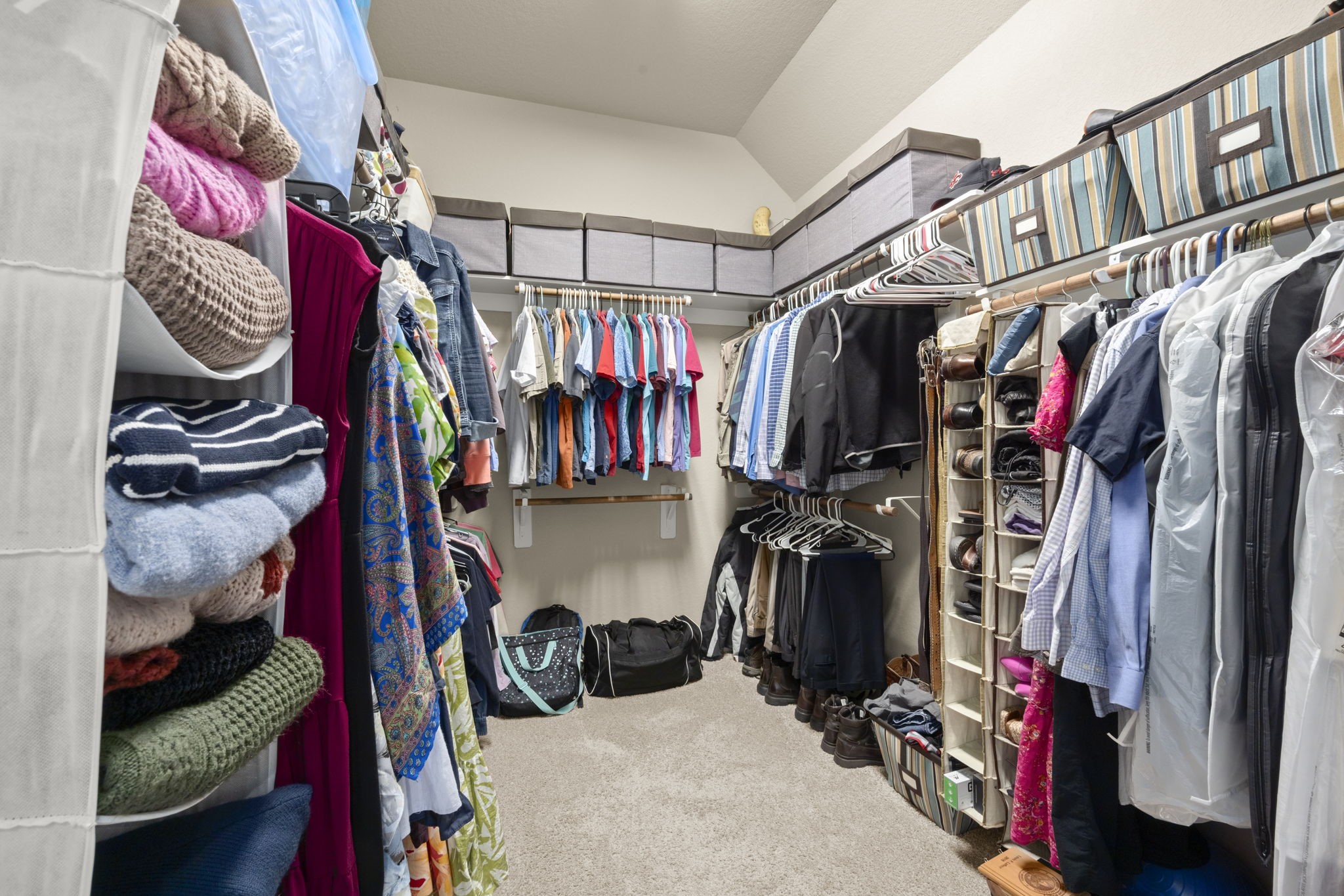 25306 Doyle Sands Court Spring, TX 77389 - Photo 21 of 35 Generous walk-in closet with ample storage and organization space.