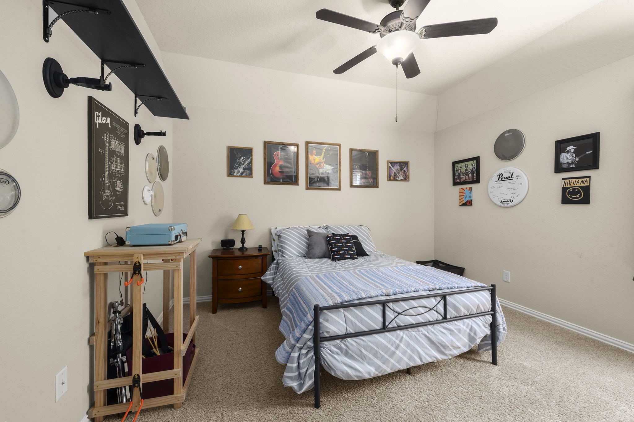25306 Doyle Sands Court Spring, TX 77389 - Photo 29 of 35 Charming upstairs second bedroom with en suite private bathroom access, neutral tones, and cozy vibe.