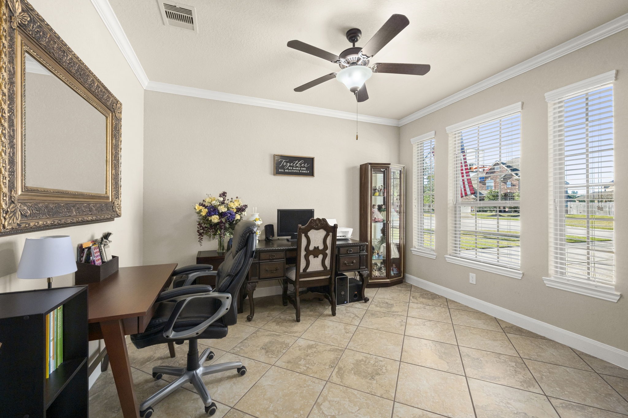 25306 Doyle Sands Court Spring, TX 77389 - Photo 10 of 35 Light-filled space just off the entry with glass double doors, offering flexibility for a home office, library, or creative room.