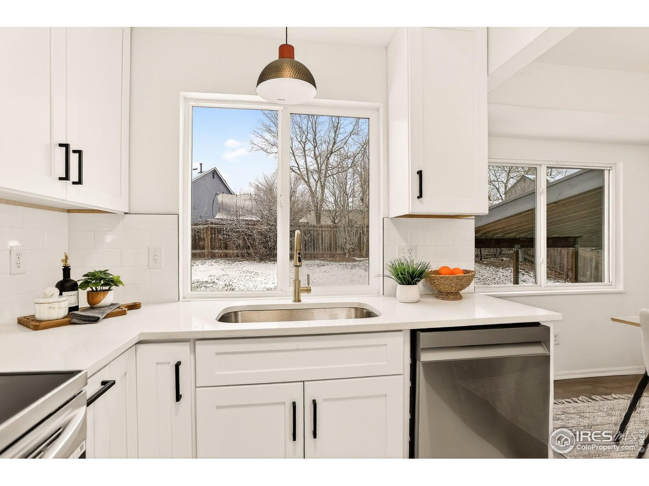 919 Vetch Circle Lafayette, CO 80026 - Photo 11 of 20 a kitchen with a sink and a window