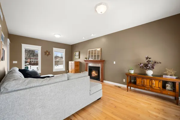 a living room with furniture and a table