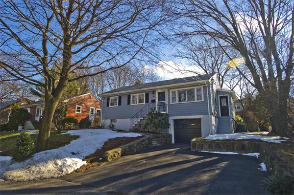 49 Yerxa Road Arlington, MA 02474 - Photo 1 of 1 a front view of a house with a yard