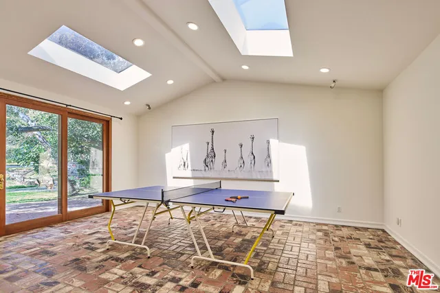 a living room with a rug