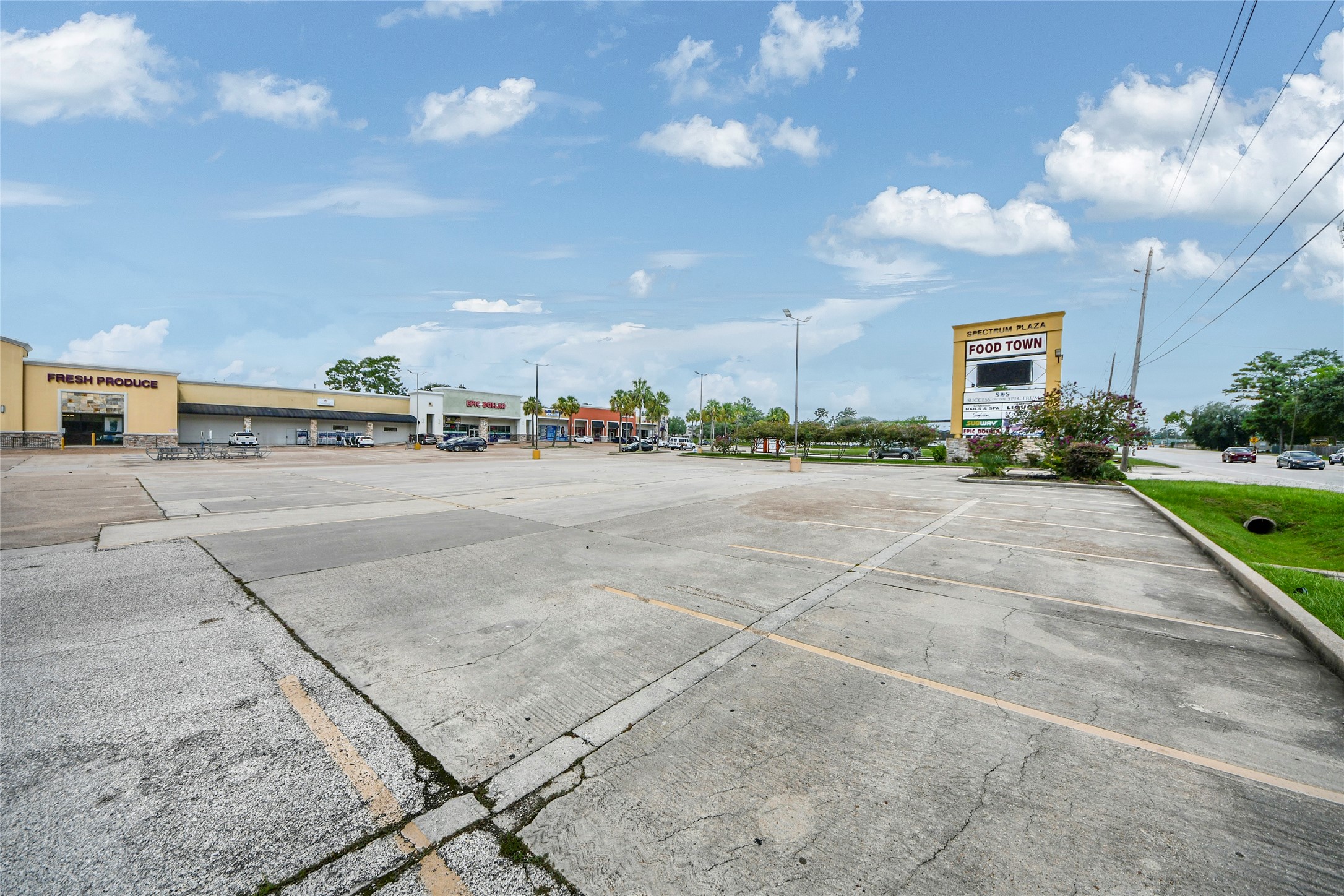 23221 Aldine Westfield Road Spring, TX 77373 - Photo 11 of 30 a view of a parking space and a car parked in front of it