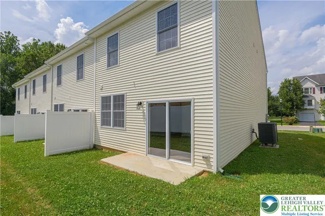 a view of backyard with a garden and plants