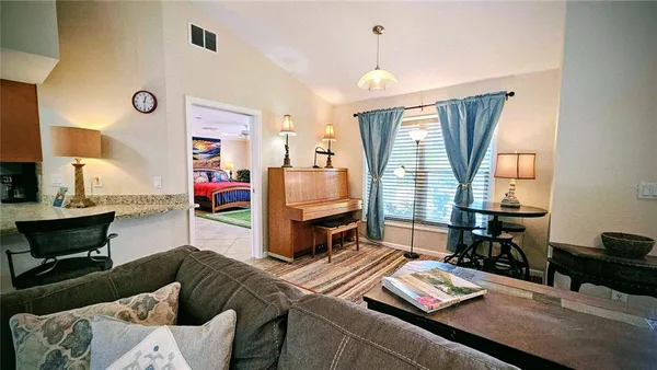 a living room with furniture and a window