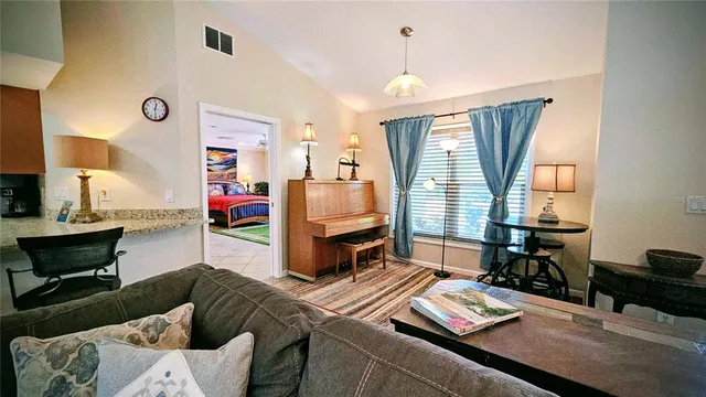 a living room with furniture and a window