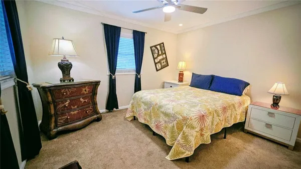 a bed room with a bed and a lamp