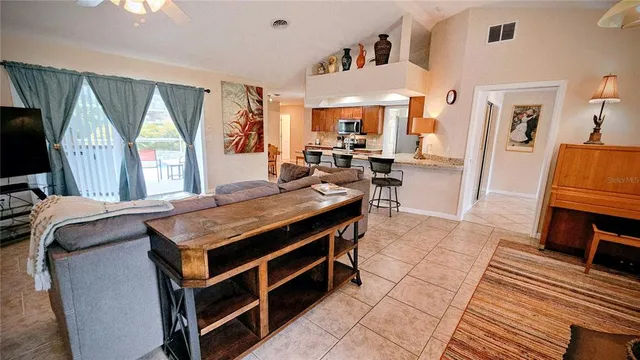 a living room with a couch and a flat screen tv