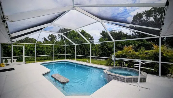 a view of outdoor space with swimming pool