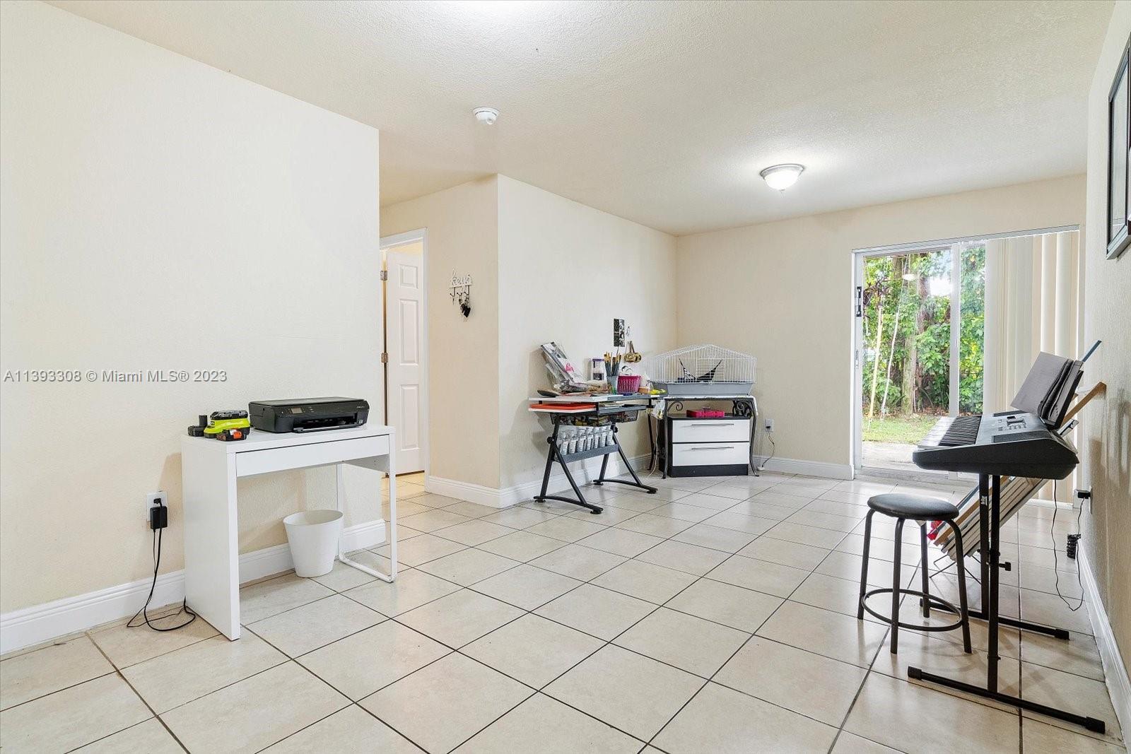 11750 Southwest 223rd Street Miami, FL 33170 - Photo 12 of 28 a workspace with furniture and window