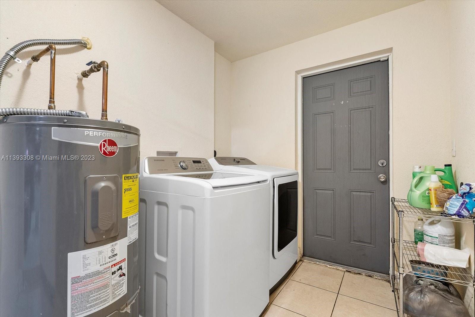 11750 Southwest 223rd Street Miami, FL 33170 - Photo 19 of 28 a utility room with dryer and washer